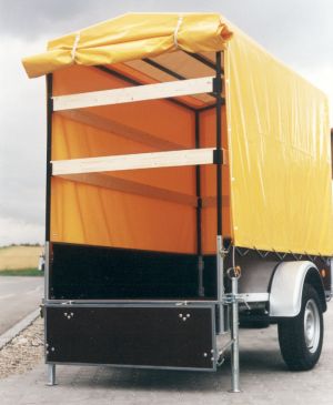 Barthau HO 1300 mit Planenaufbau gelb offen